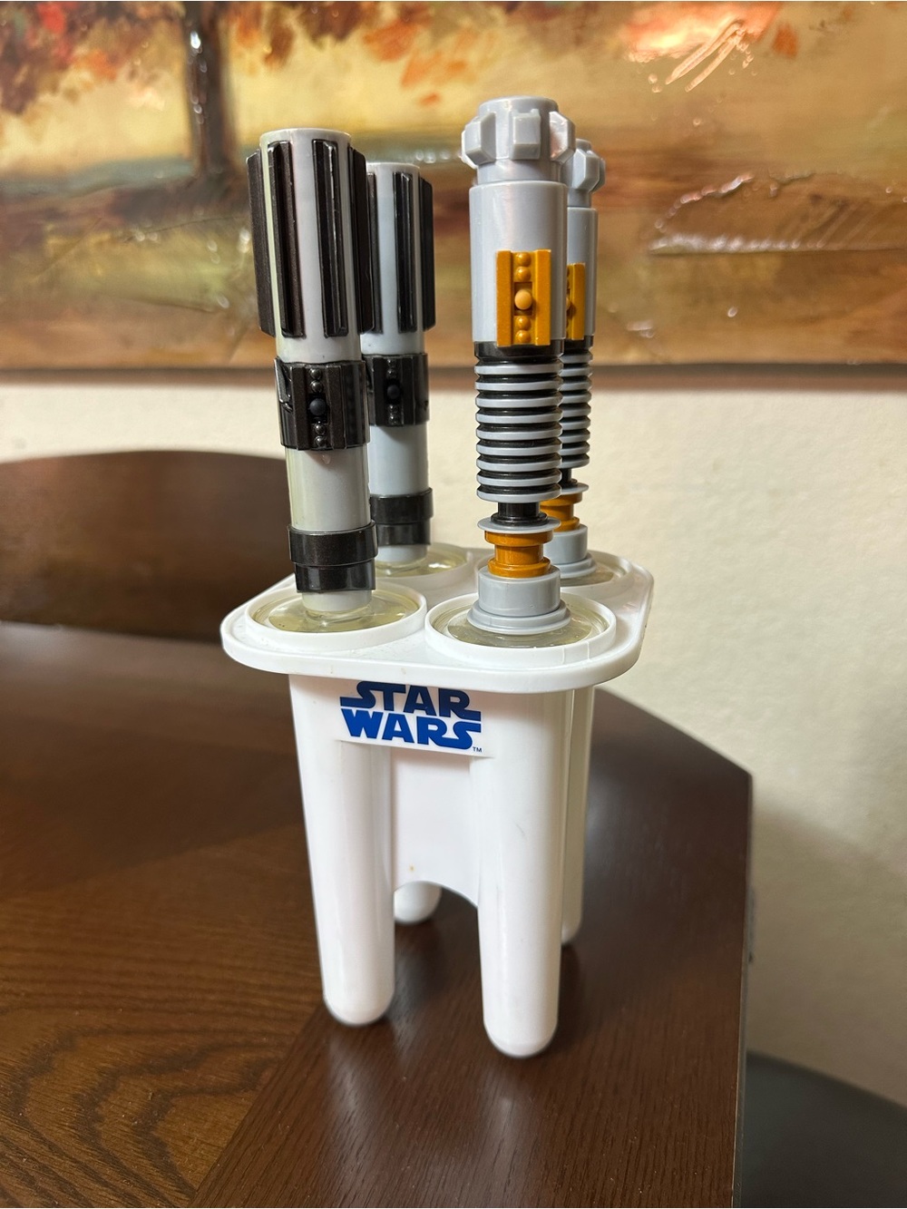 Star Wars White Popsicle Mold with Black and Yellow Lightsaber Handles